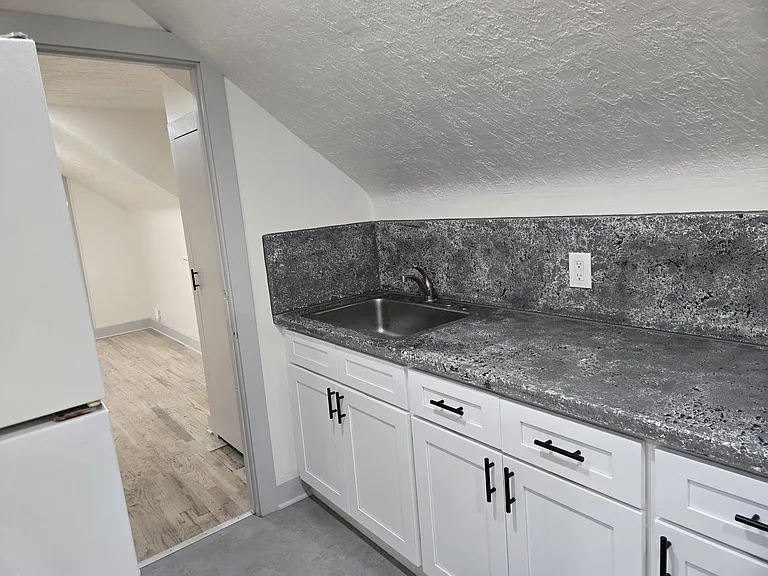 View into living area from kitchen