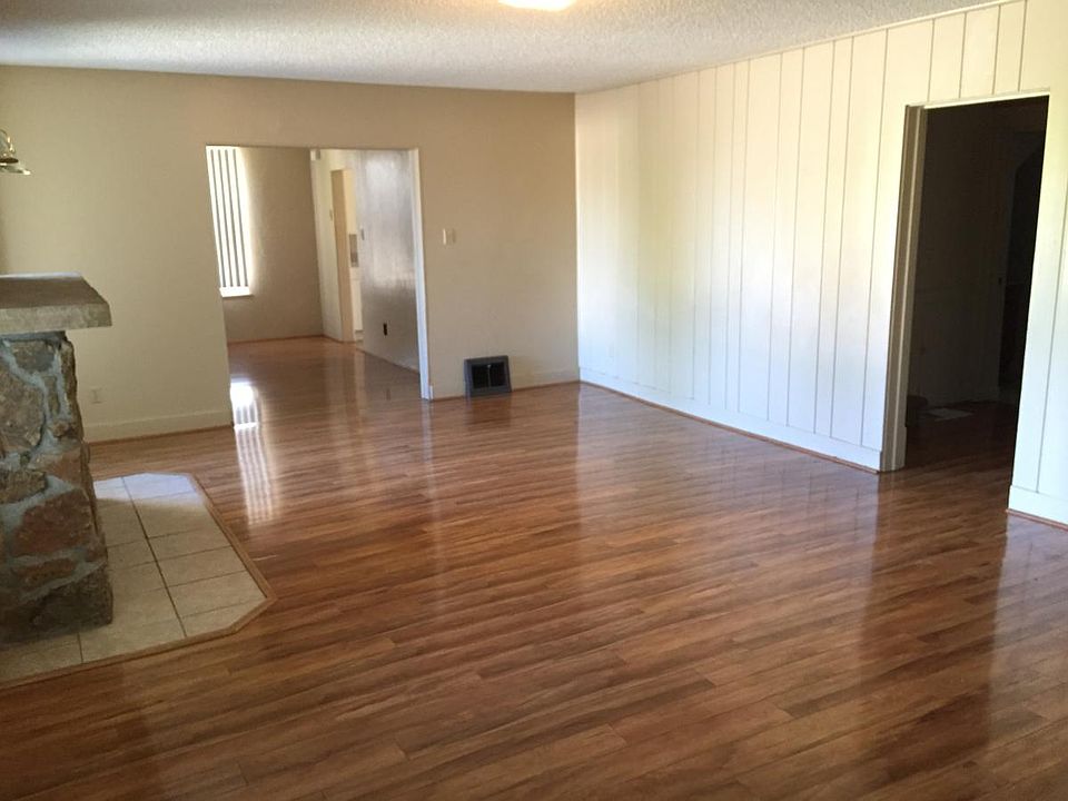 Living room with view of dining room