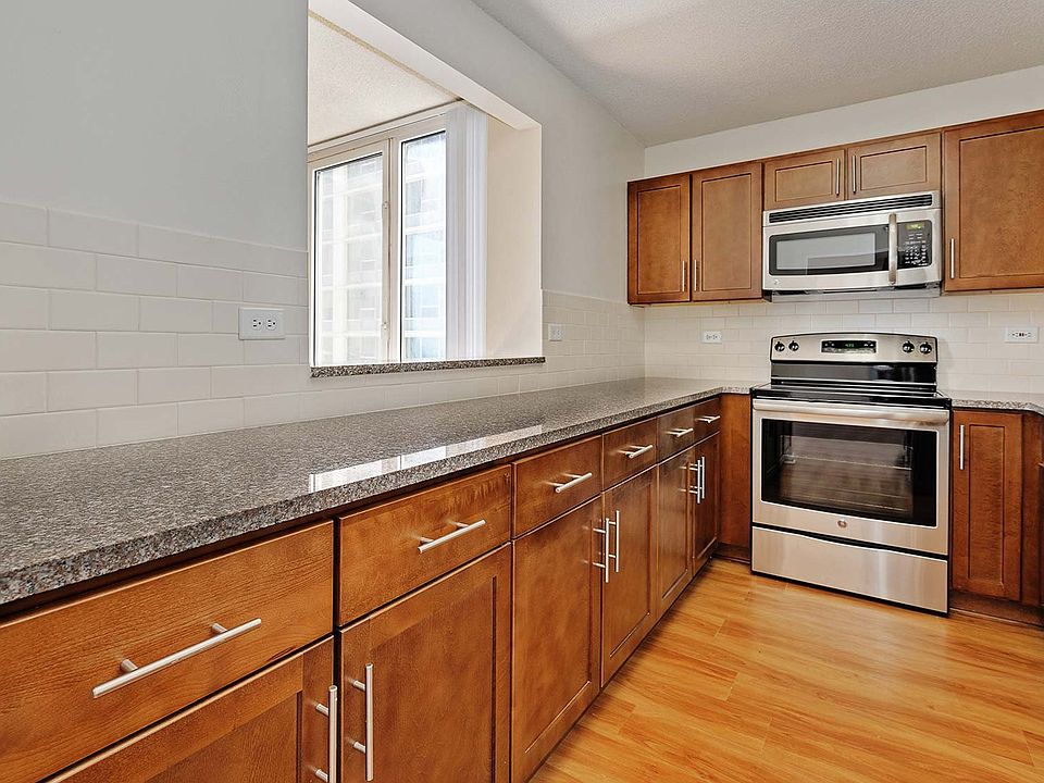 Enjoy a newly-renovated kitchen with granite countertops and stainless steel appliances