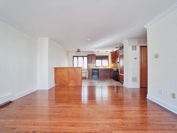 Open concept living room extra large custom eat in kitchen