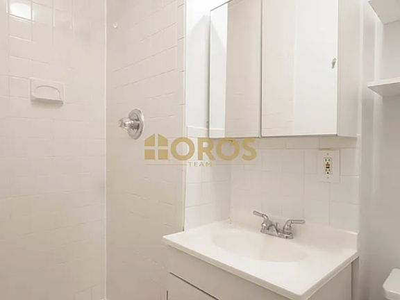 5th image of 217 E 10th St APT 16