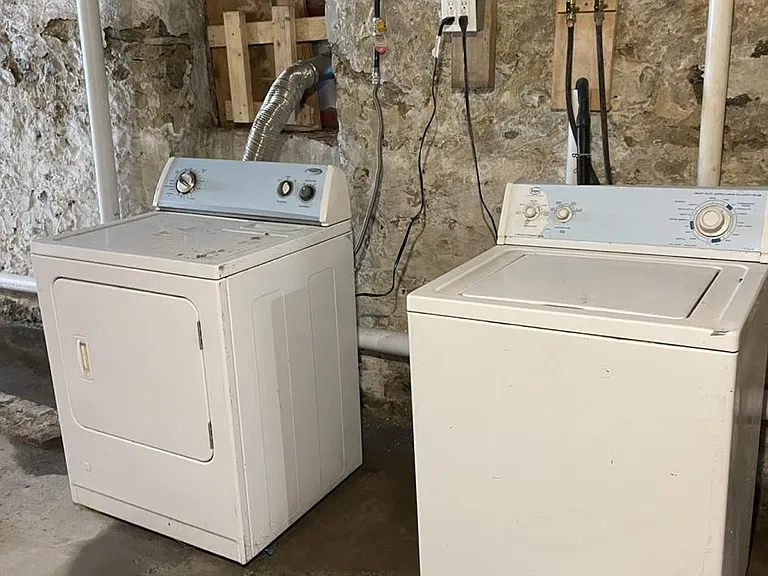Semi fix basement with washer and dryer