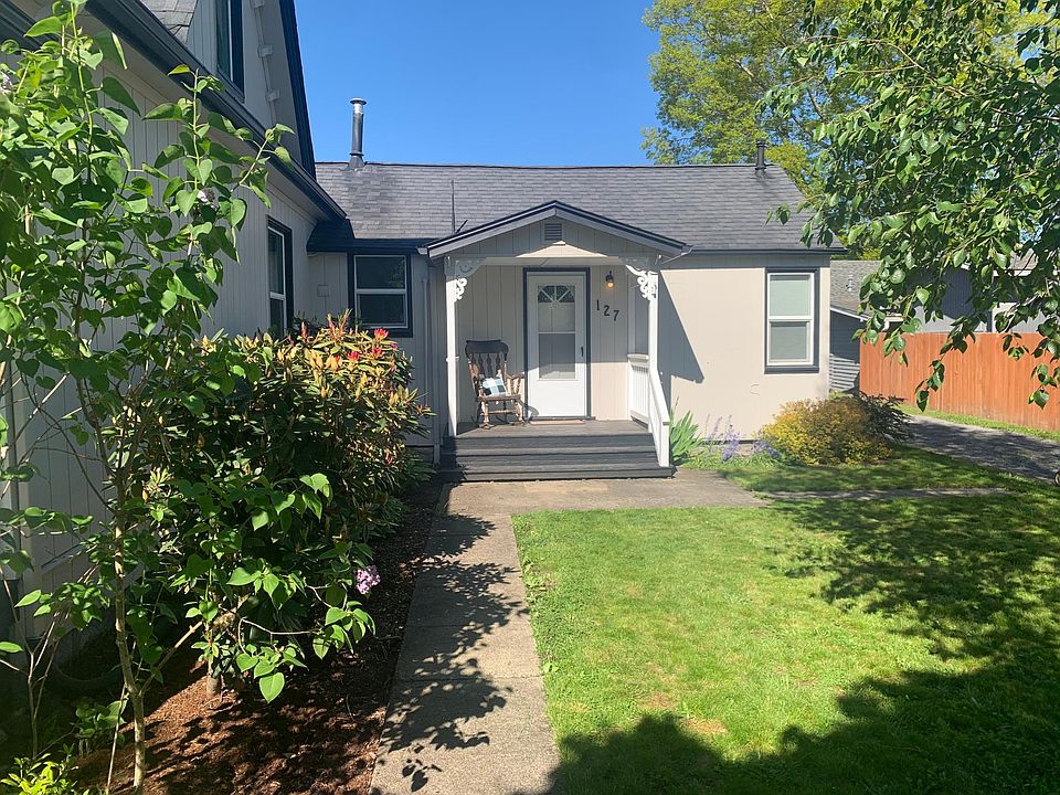 Beautiful home with new exterior paint. A private well lit covered entrance.