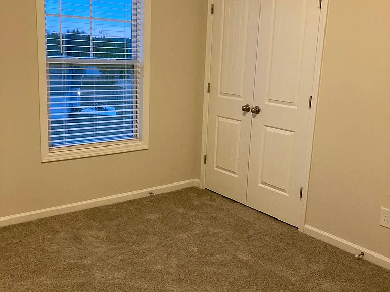 One of two secondary bedrooms.