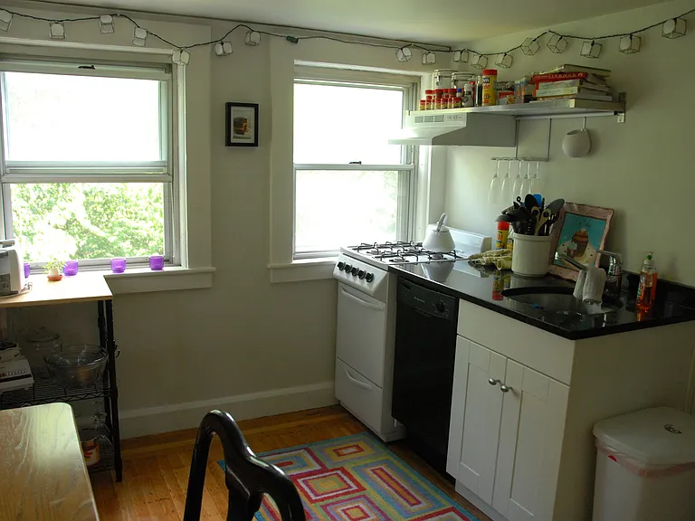 kitchen with gas range and dish washer & sink. Granite countertop