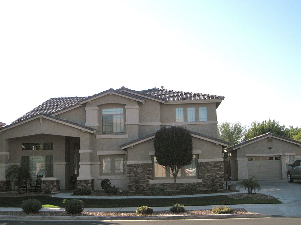 From of home & detached garage