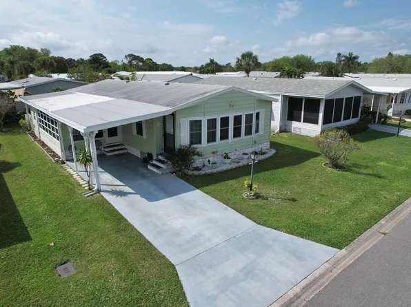 460 Dolphin Cir, Barefoot Bay, FL 32976