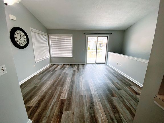 Living room and sliding door to large back deck.