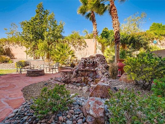 Fire pit and water feature makes this a wonderful place to escape to.
