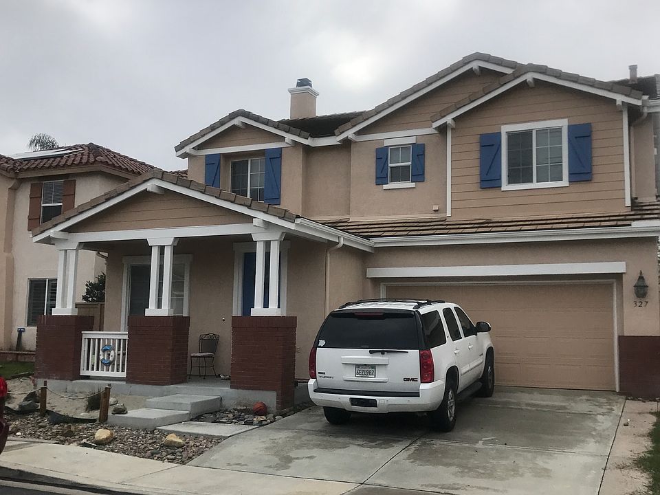 Front of house with desert landscaping
