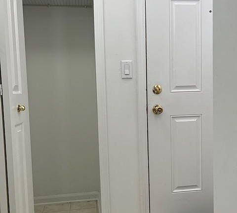Coat Closet at Entrance Door