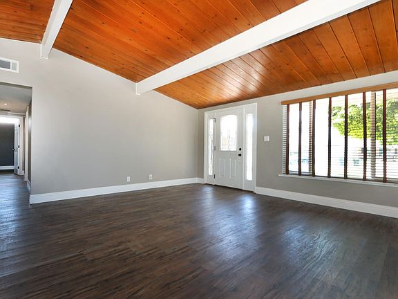 Spacious living room, Beautiful Entry Doors.