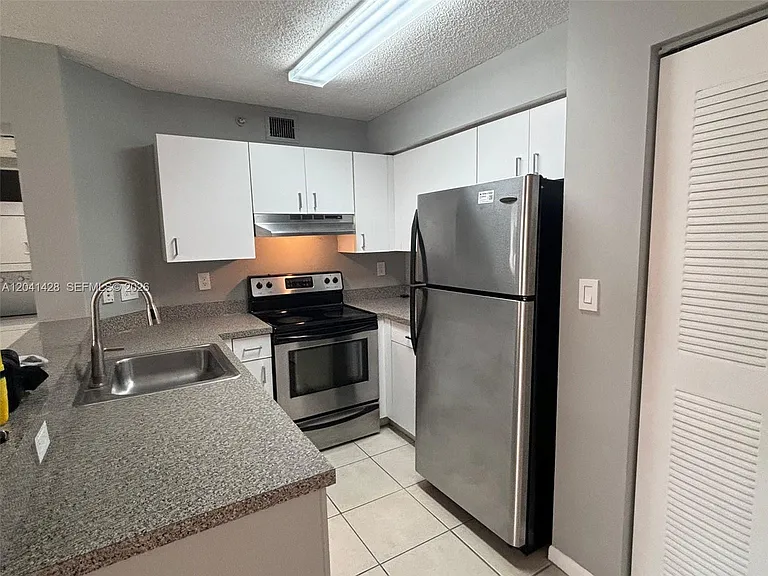 761 N Pine Island Rd #203 — Photo 13