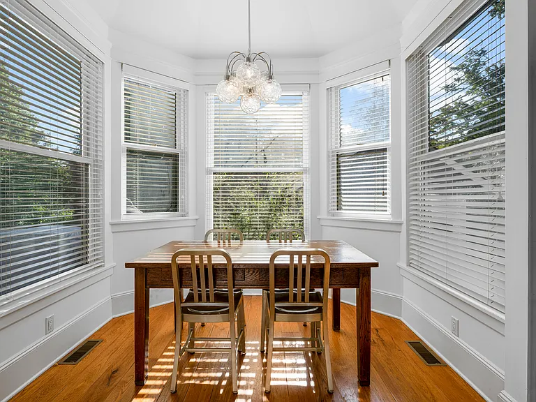Breakfast room overlooks backyard