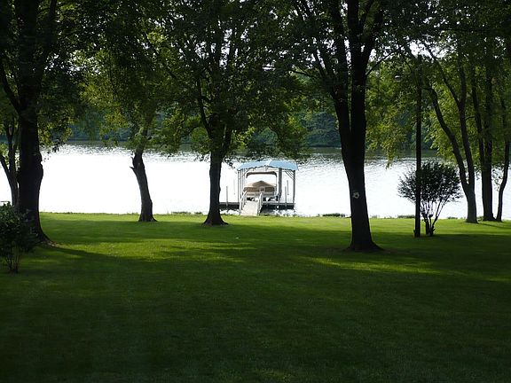 View of lake / dock from patio