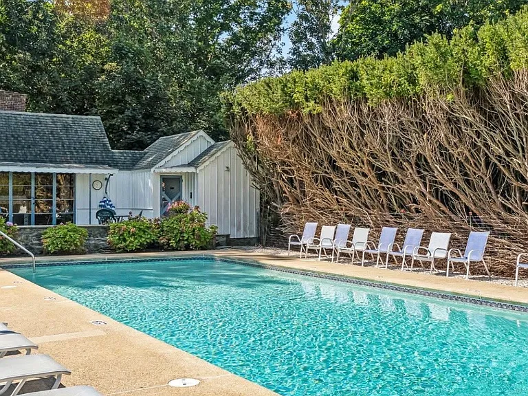 The swimming pool and pool house