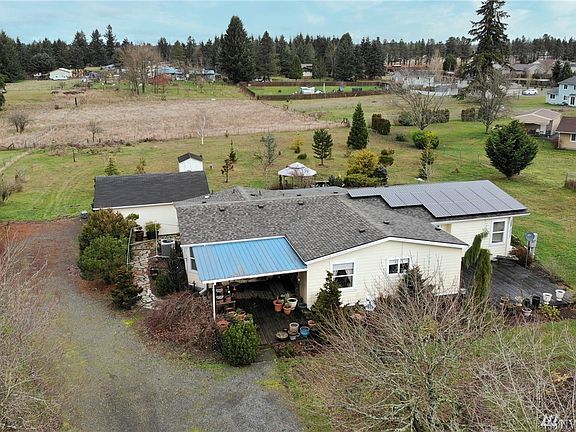 The home sits on over an acre of land on a nice level lot. 