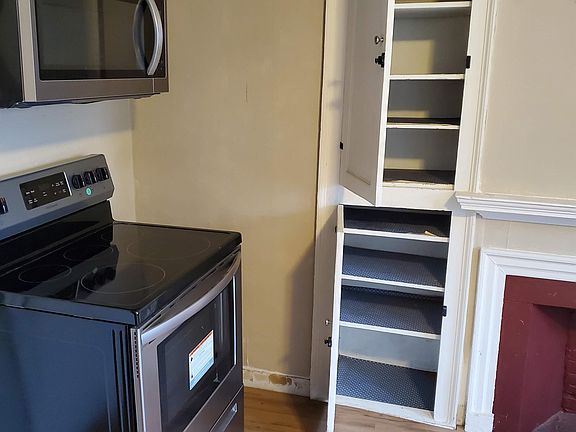 New stove and microwave with built-in cabinets