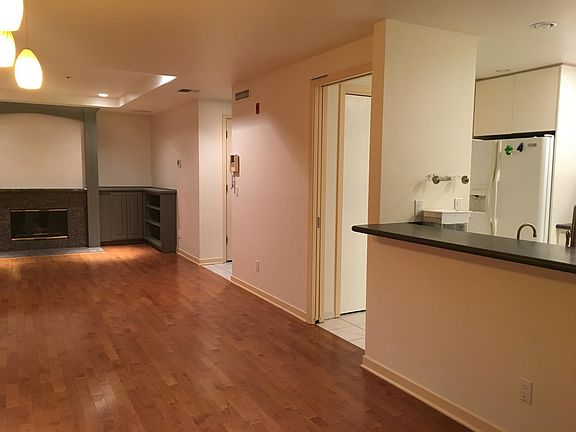 kitchen off formal living room and dining