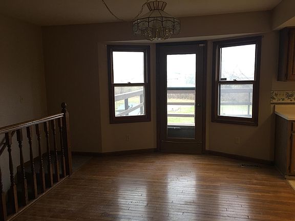 Dining room opens to deck and staircase going down