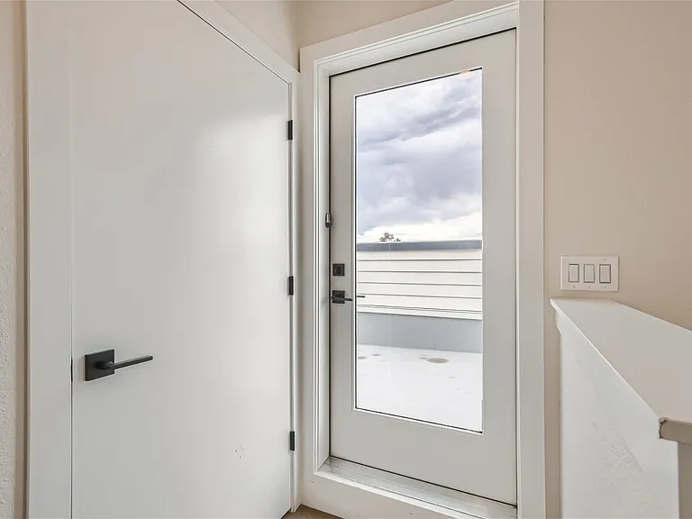 Third floor storage / furnace space with exit to beautiful rooftop patio