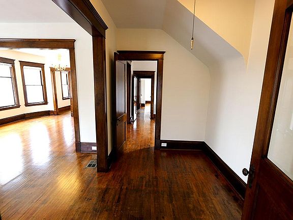 The front entry opens to a traditional foyer with access to 