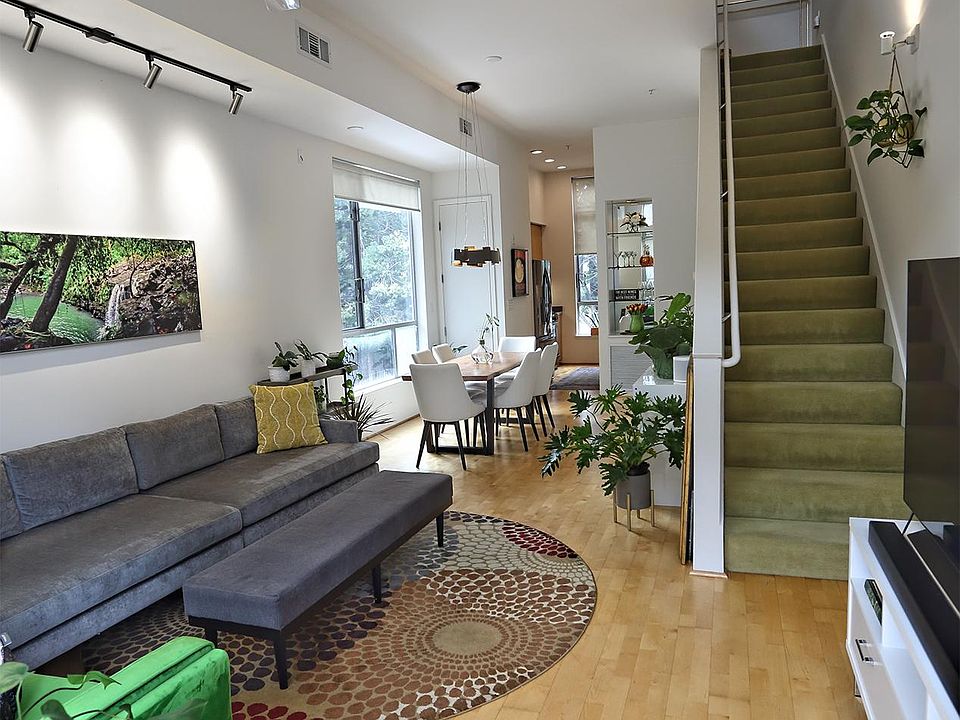 View of living room and dining room from front door.