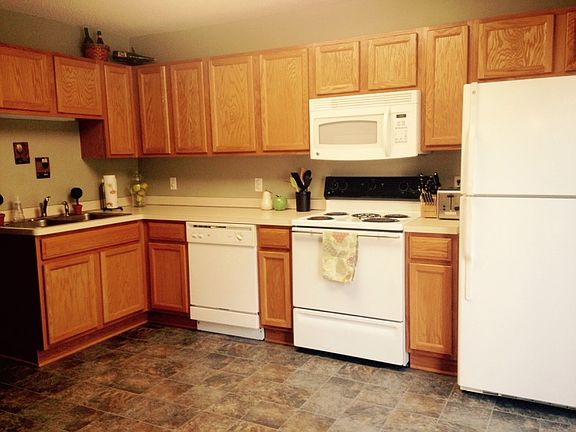 Kitchen
						:
						Oak cabinets with new flooring just installed and Eat in kitchen area for table.