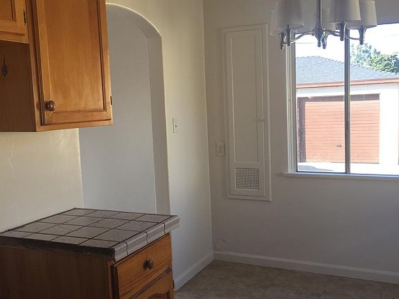 Kitchen with view of 1 car garage