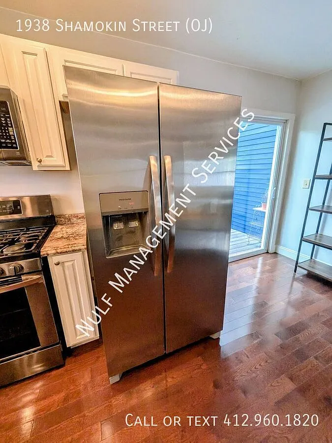 2 bed, 2 bath + finished basement and 2 car garage in South Side Slopes — Photo 1