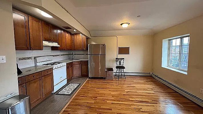 1st image of 867 E 92nd St Floor 2