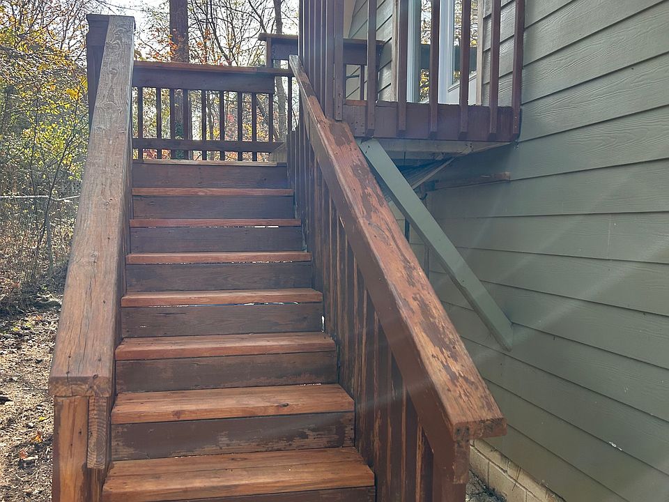 Stairs to studio entrance with balcony