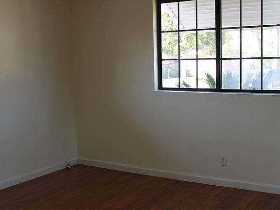 1st bedroom with ceiling fan and brand new room air conditioner. You will be the first one to use it.