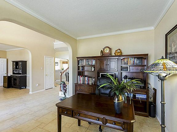 Spacious living with custom tile extended throughout home