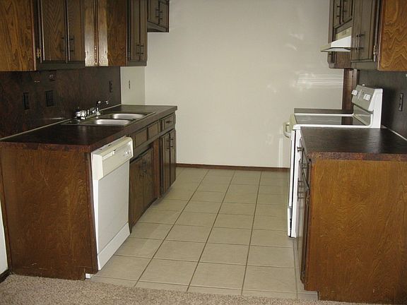 House-sized galley kitchen - updated smooth top range and ceramic tile