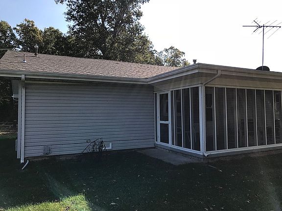 Screened in porch on back
