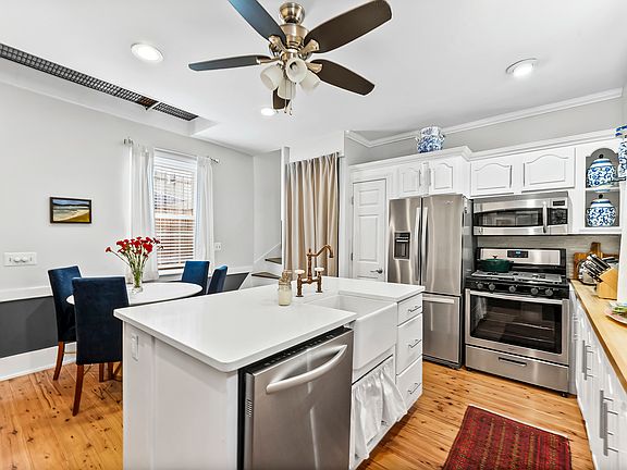 kitchen with island and stainless steel appliances