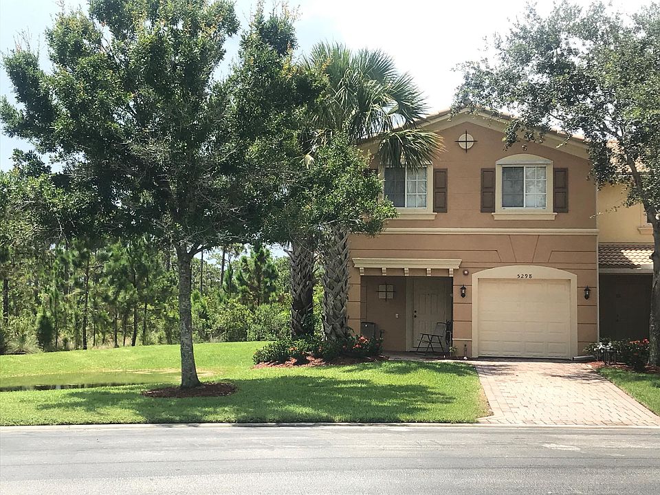 Spacious end unit townhouse backing to a preserve.