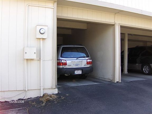 Private, enclosed carport w/direct entry into home.