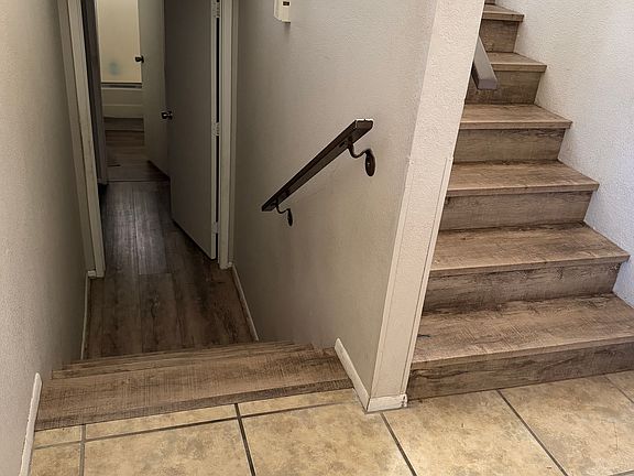 When walking in from front door- can go upstairs, downstairs, or to the garage.