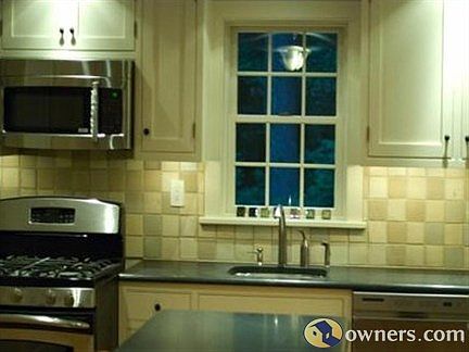 Craftsman Tilework and Custom Cabinets