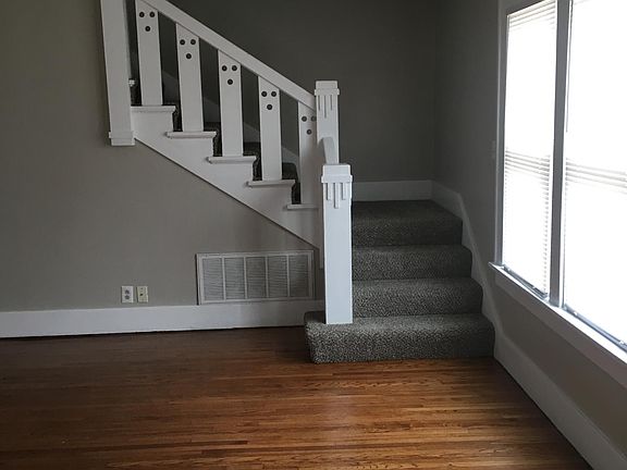 Living. New carpet on stairs.