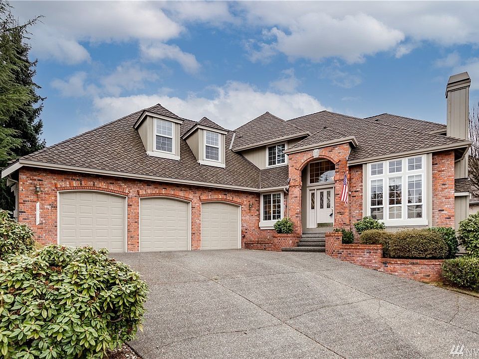 The home has a commanding presence on a corner lot in the prestigious Highpointe neighborhood