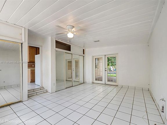 Converted garage was once used as a master bedroom or could be large family room with access to patio. Room for bathroom. .