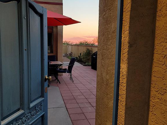 Enjoy breathtaking sunsets and mountain views from your private courtyard. Perfect for dining, relaxing, or entertaining under the New Mexico sky.