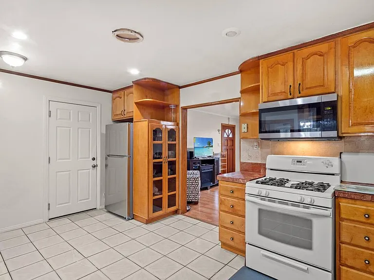 Kitchen with Fridge - door to garage