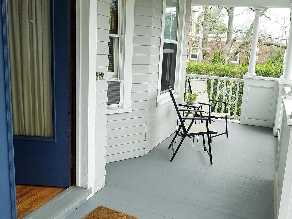 The porch is assigned exclusively to the first-floor apartment.