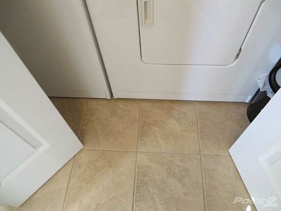 Laundry 1st floor with ceramic tile
