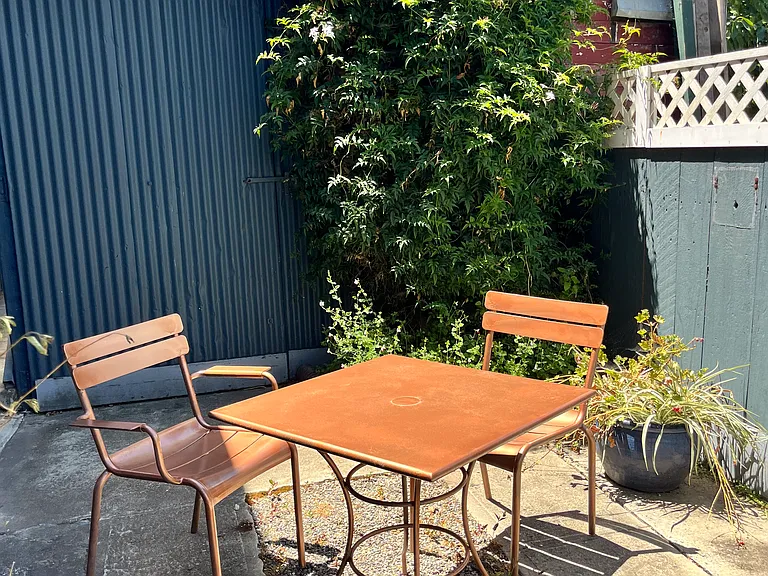 Outdoor table, 2 more chairs not shown