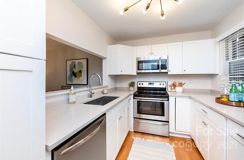 Fully updated Kitchen with Quartz countertops and stainless steel appliances